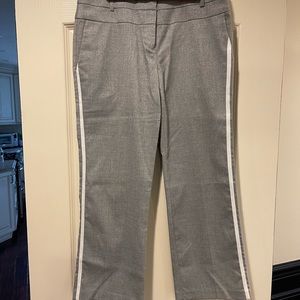 Fun sliver glittery crop pants with a white stripe down the side.